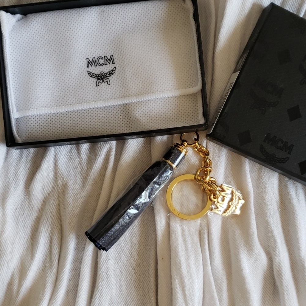 MCM navy leather tassel keychain price firm